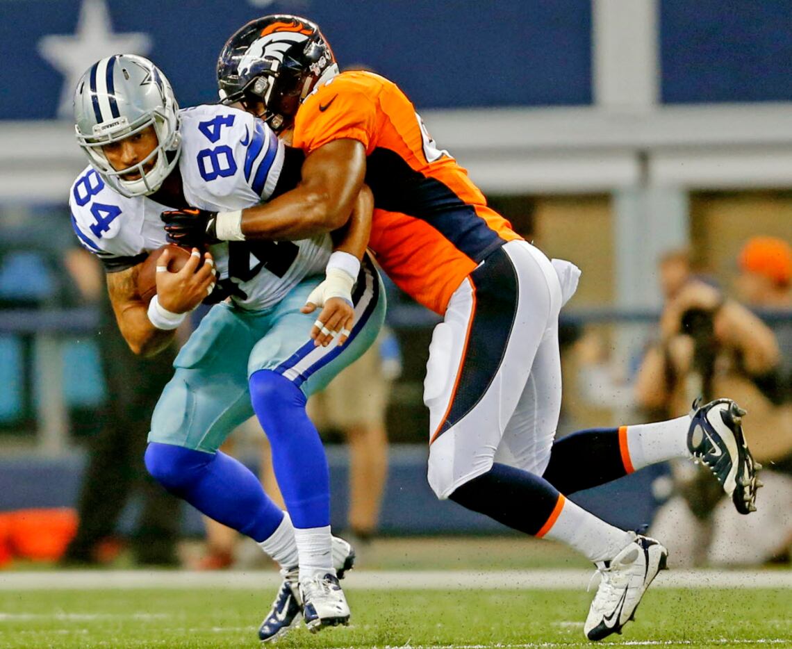 Denver Broncos outside linebacker Corey Nelson (47) tackles Dallas Cowboys tight end James...