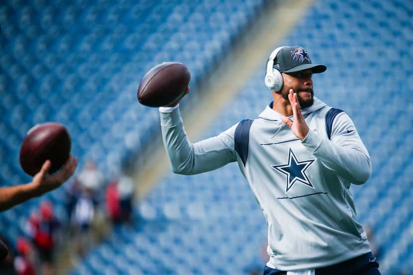 Dallas Cowboys quarterback Dak Prescott (4) warms up during the pregame workouts of an NFL...