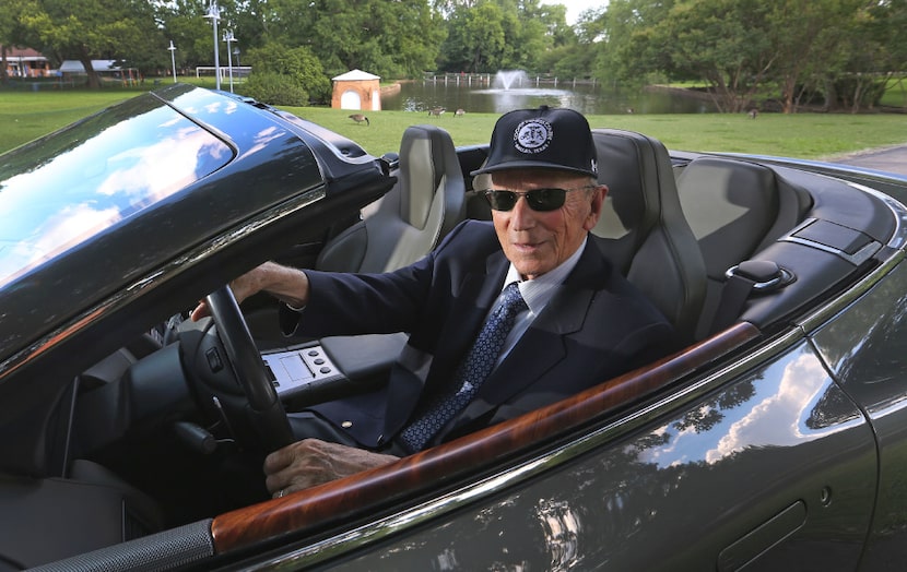 Dr. Kenneth Cooper and his Aston Martin at the Cooper Aerobic Center in Dallas