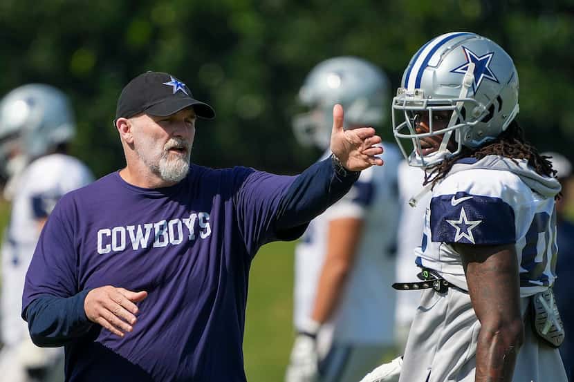 Dallas Cowboys defensive coordinator Dan Quinn directs players as wide receiver CeeDee Lamb...