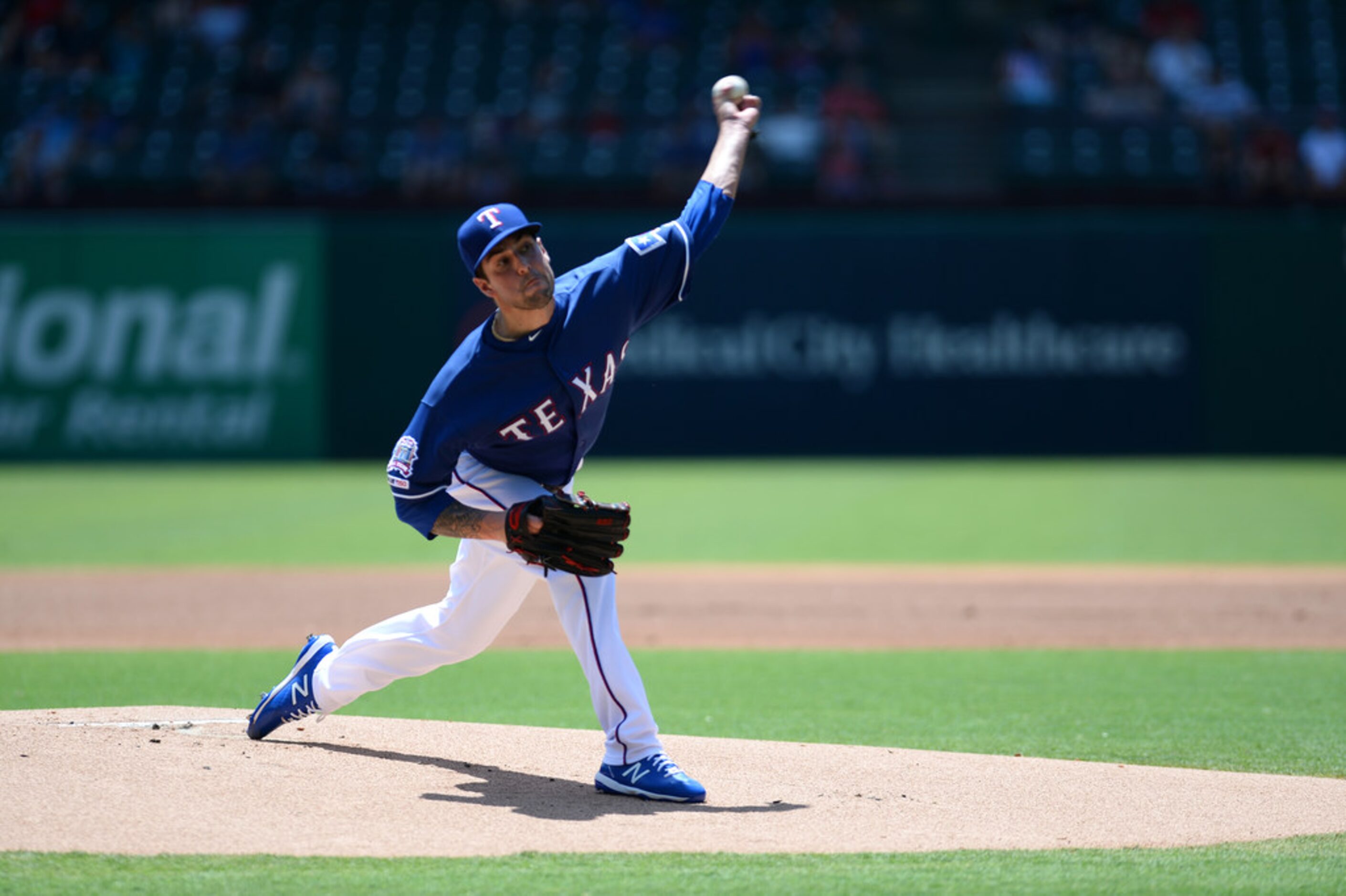 ARLINGTON, TEXAS - AUGUST 20: Joe Palumbo #62 of the Texas Rangers pitches against the Los...