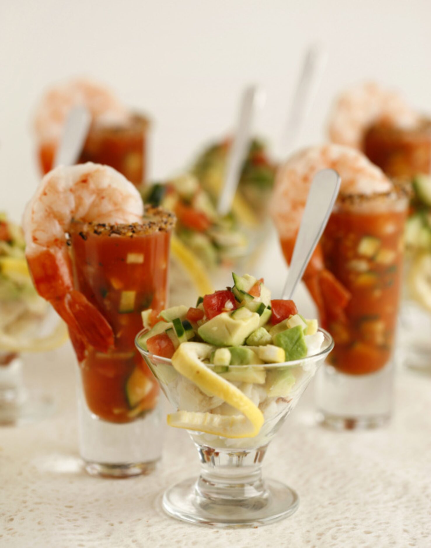 SHRIMP SHOOTERS: Fill a tall shot glass with gazpacho, served with a chilled, cooked shrimp...