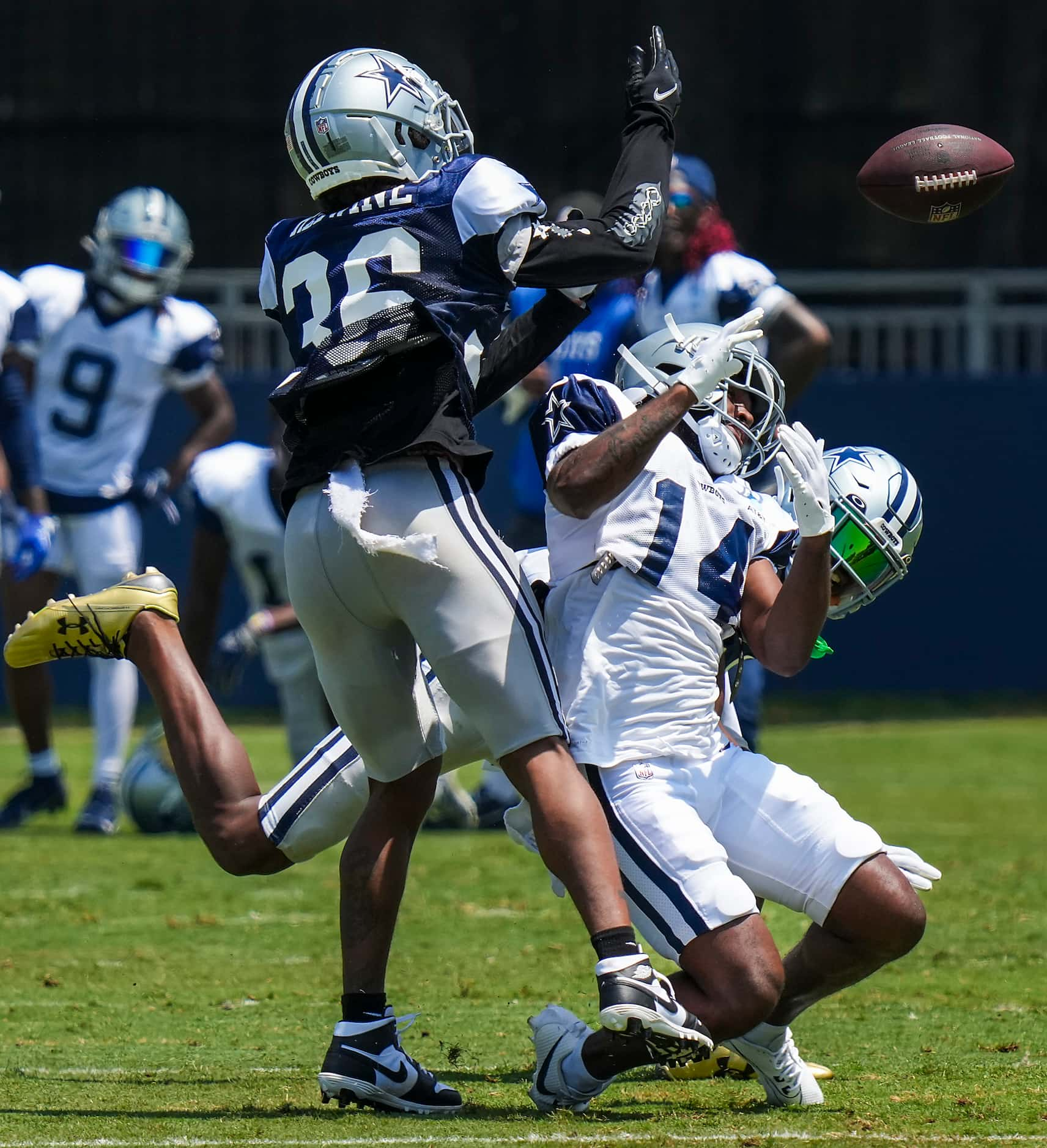 Dallas Cowboys wide receiver Jose Barbon (14) can’t make a catch as defensive back Sheldrick...