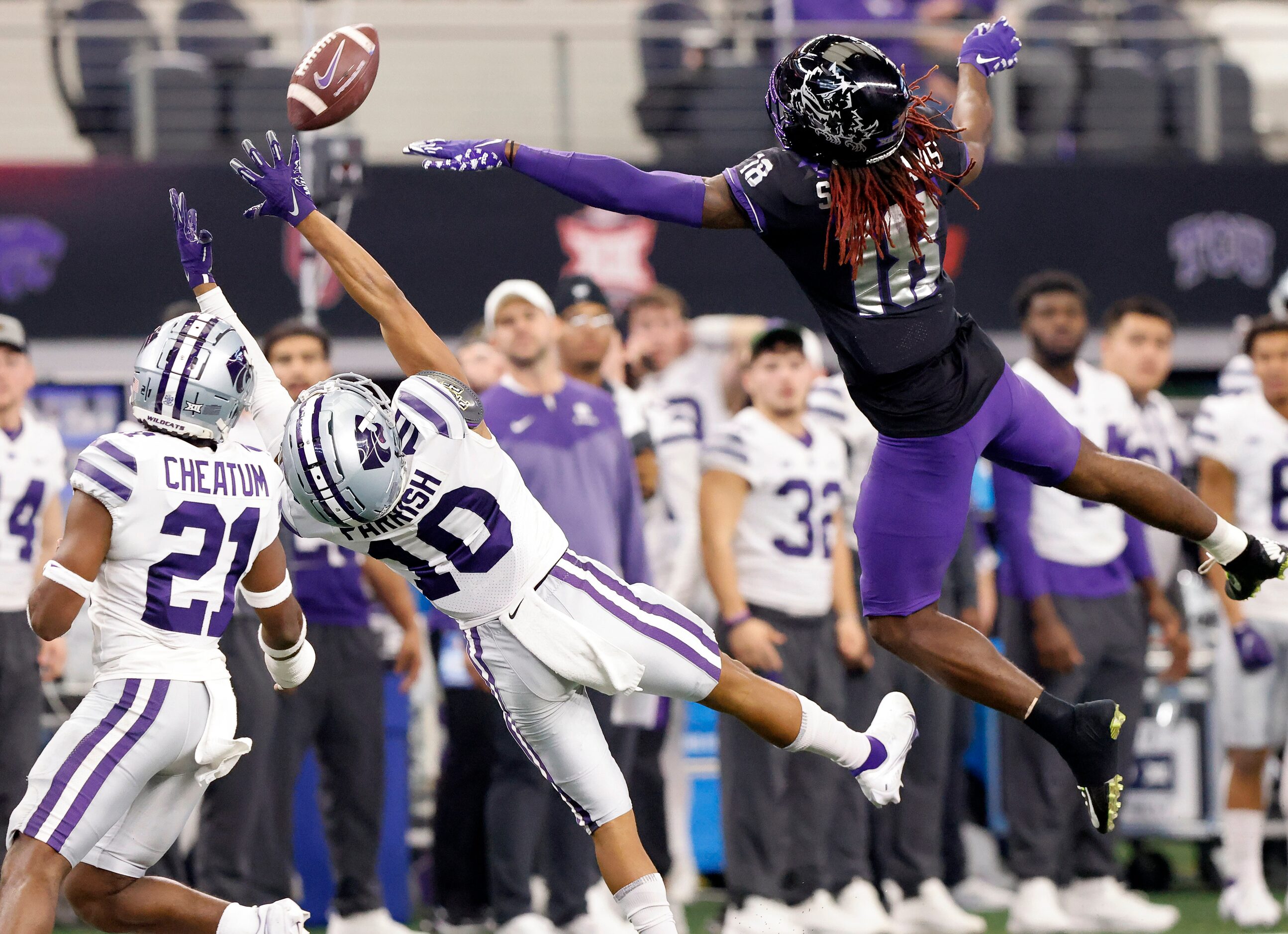 Kansas State Wildcats cornerback Jacob Parrish (10) nearly intercepts an overthrown ball...