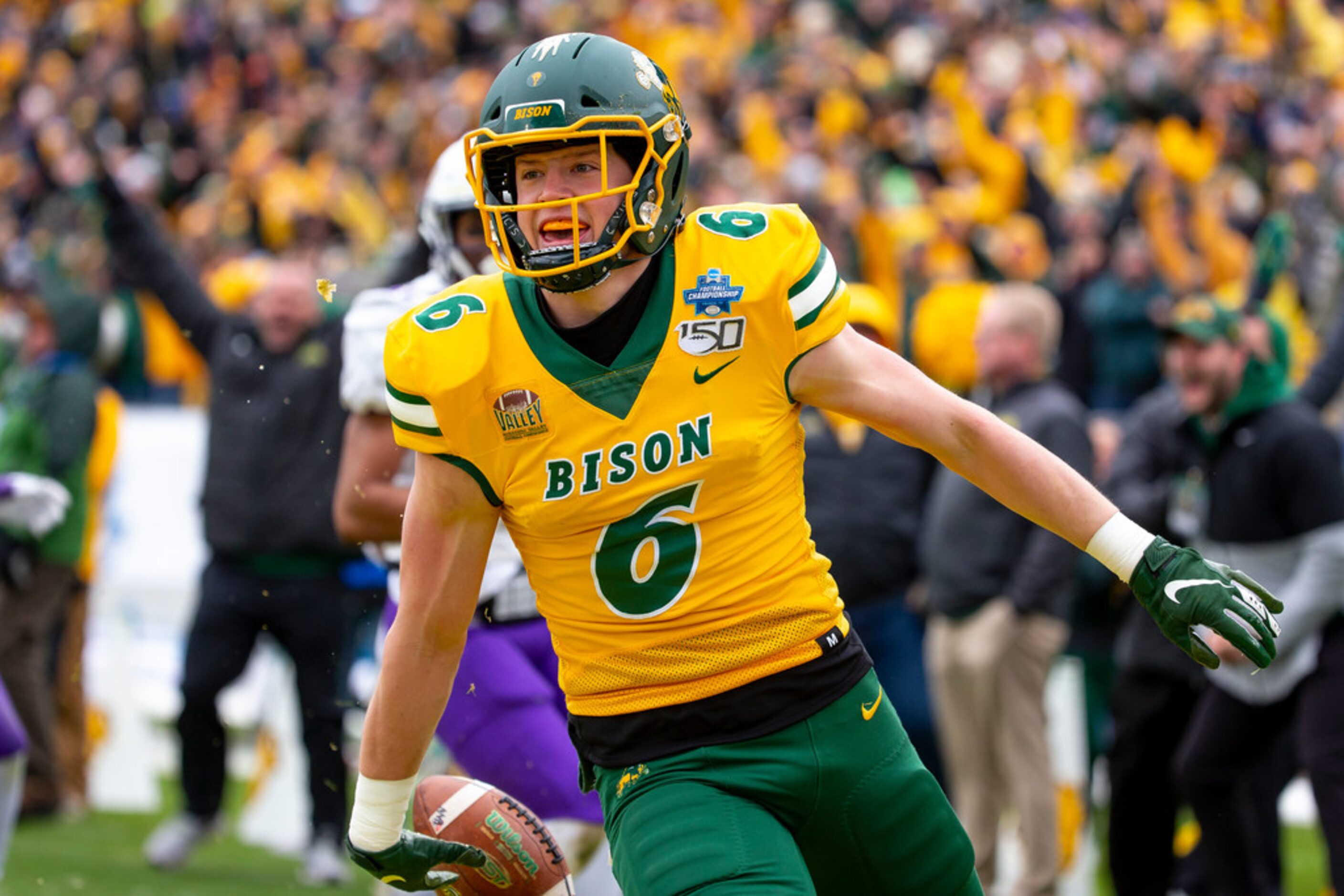 North Dakota State safety James Hendricks (6) smiles after scoring on a fake field goal...