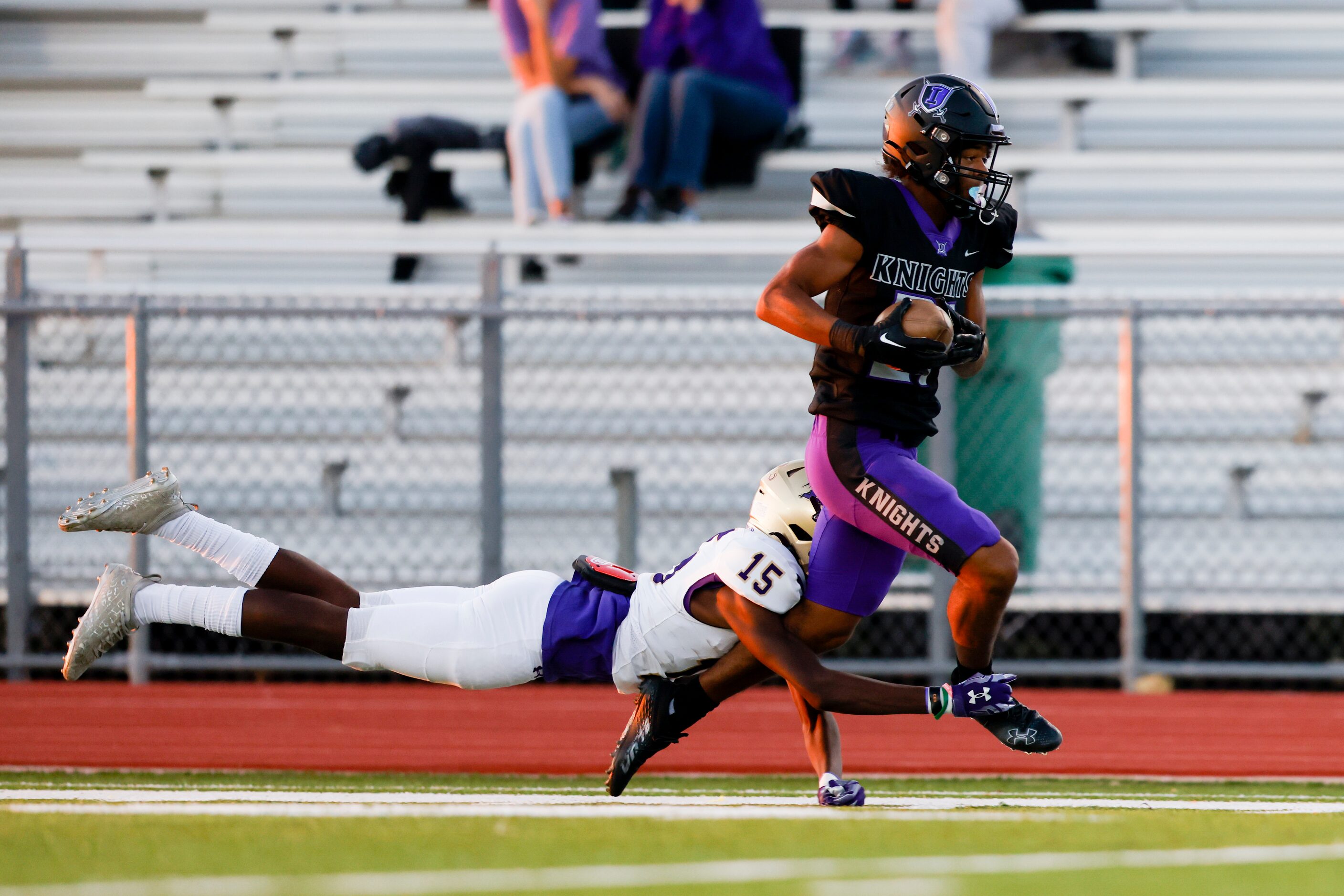 Denton’s cornerback Kaz Murphy (15) tackles Frisco Independence’s wide receiver McKenzie...