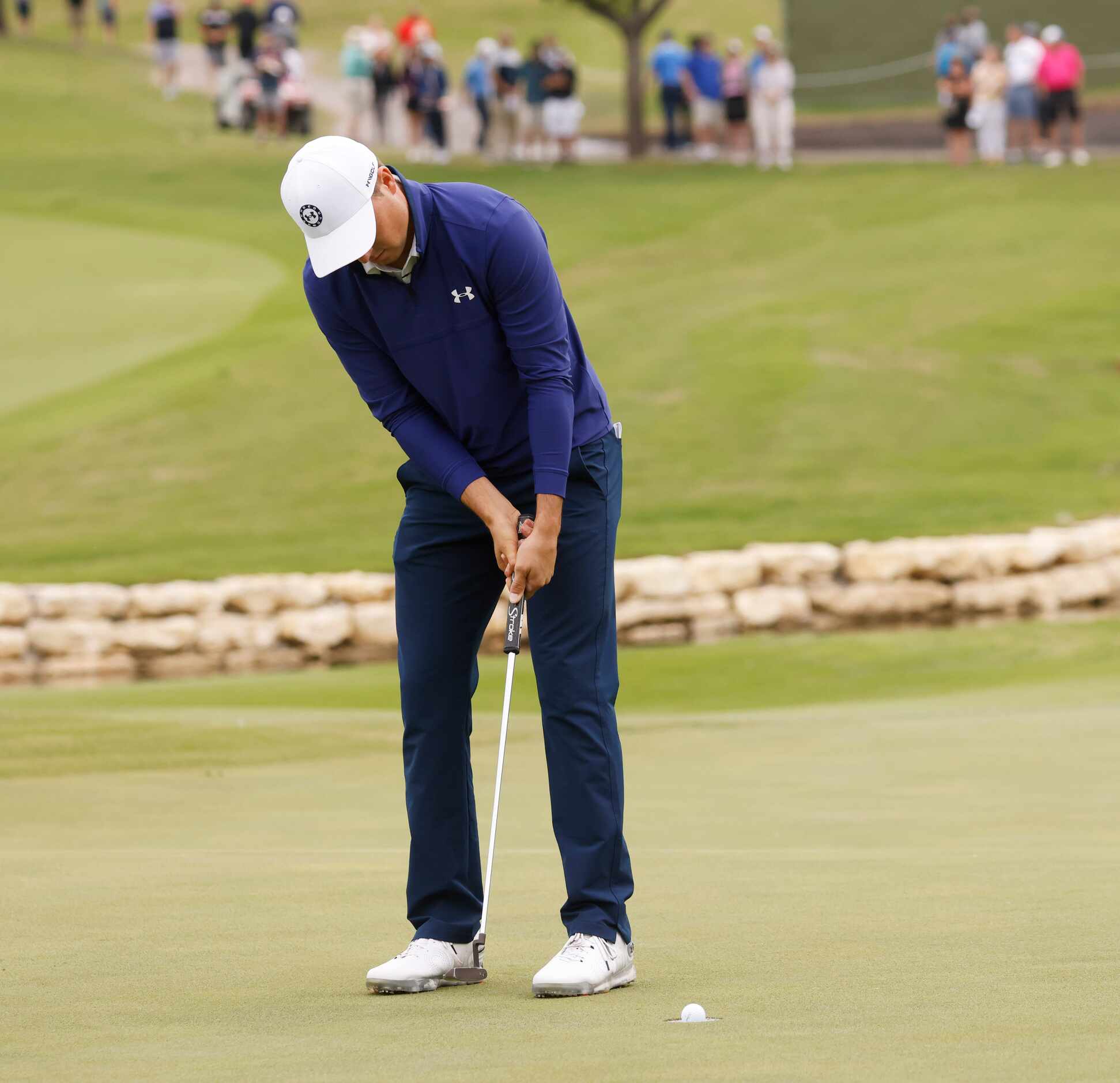 Jordan Spieth sinks a putt for par on the 18th hole during round 2 of the AT&T Byron Nelson ...