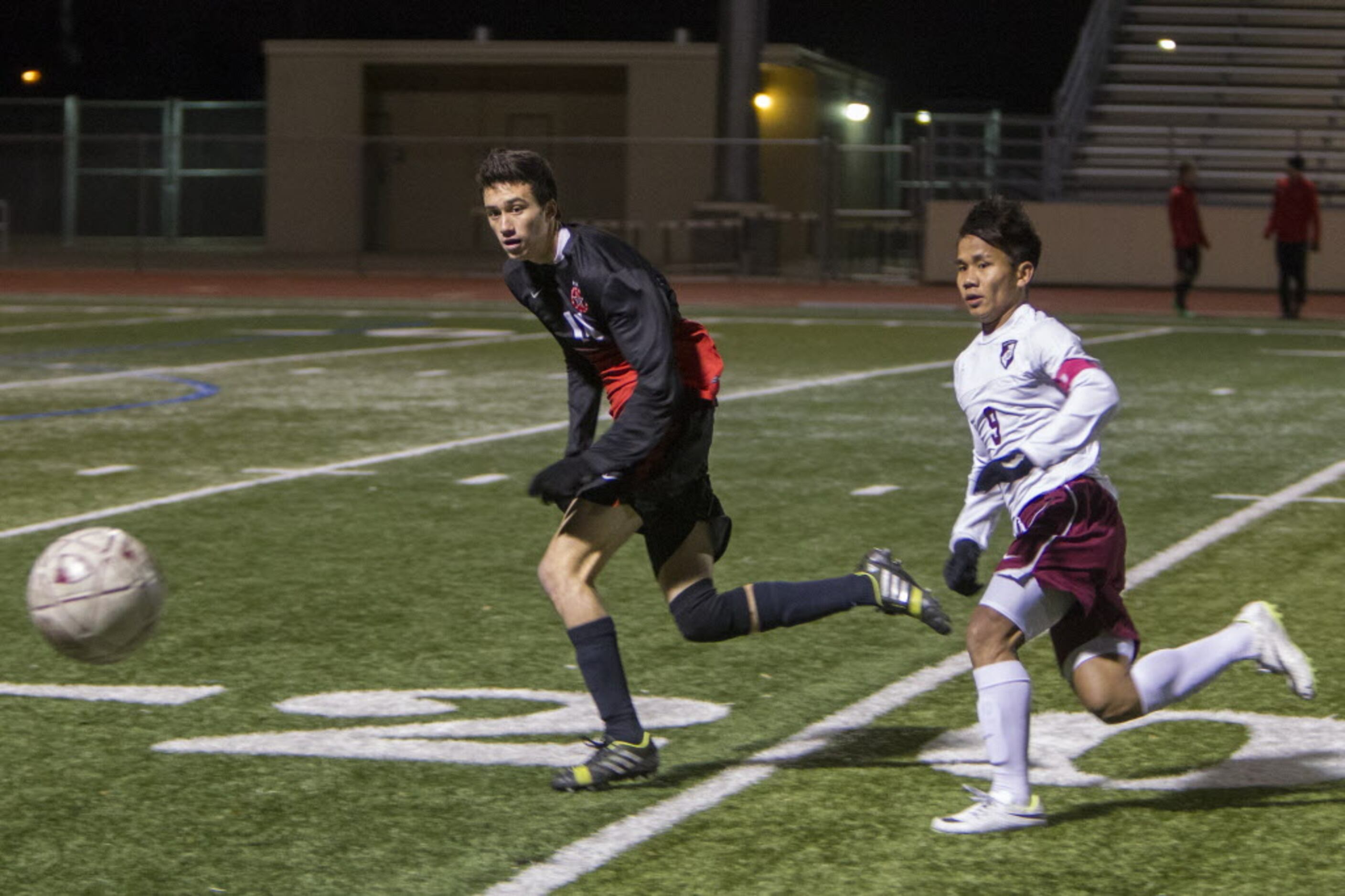 Kellen Reid (left), a senior at Coppell High School and a captain of the soccer team, goes...