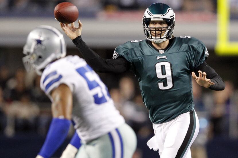 Philadelphia Eagles quarterback Nick Foles (9) looks to pass as Dallas Cowboys outside...