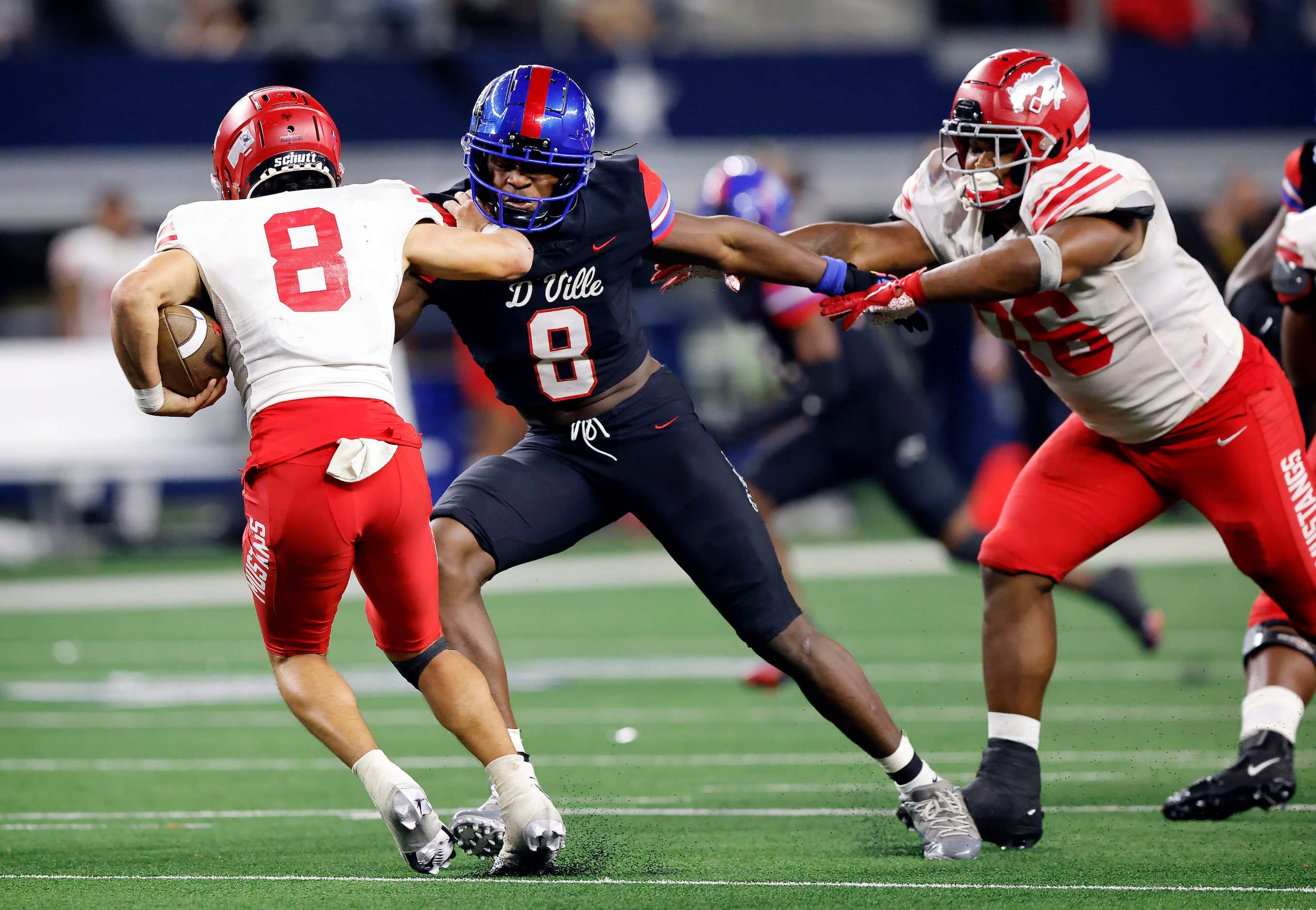 Duncanville linebacker Colin Simmons (8) brought down Galena Park North Shore quarterback...