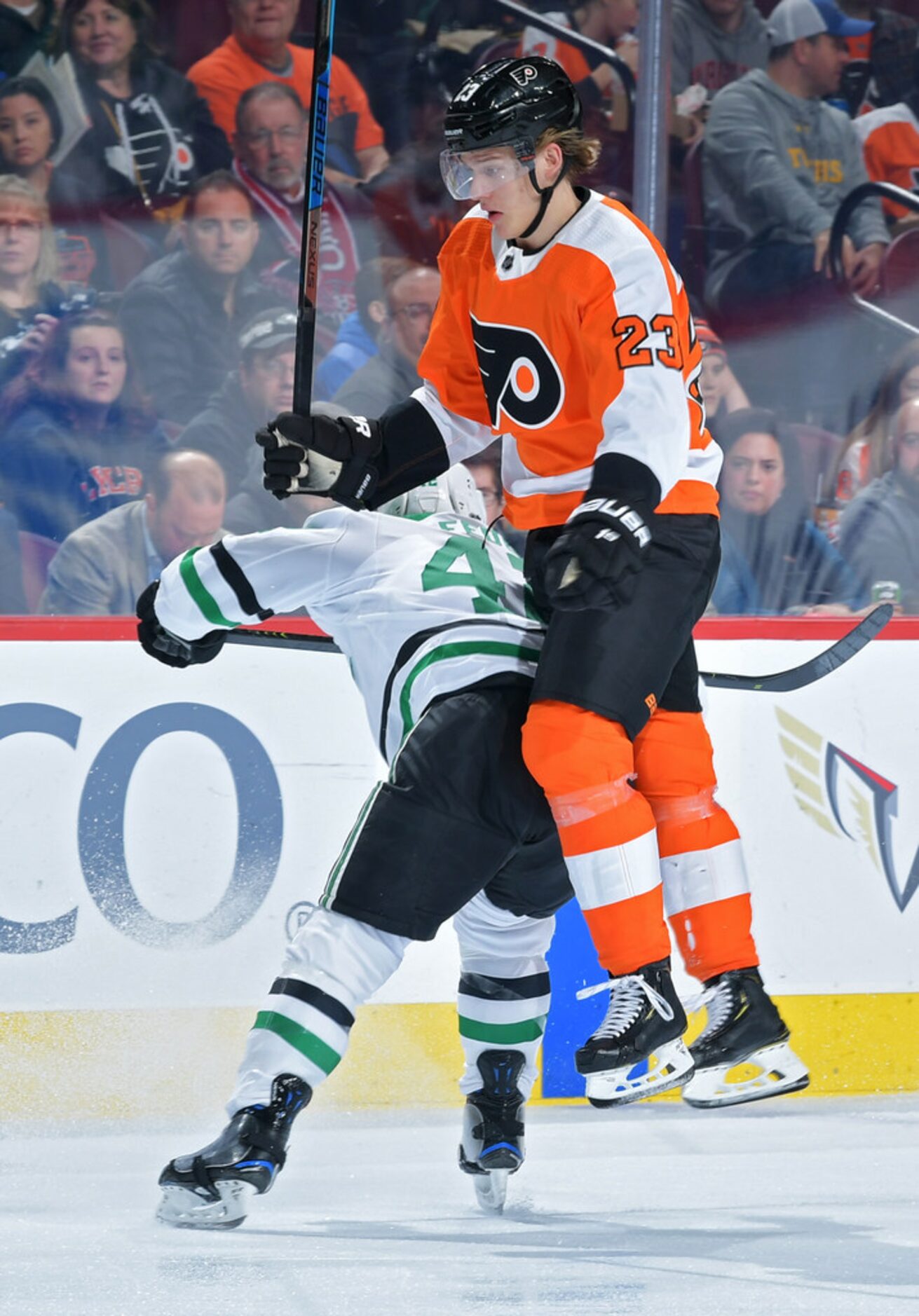 PHILADELPHIA, PENNSYLVANIA - JANUARY 10: Oskar Lindblom #23 of the Philadelphia Flyers jumps...