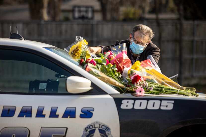 Steve Martindale pays his respects to fallen Dallas Police officer Mitchell Penton at the...