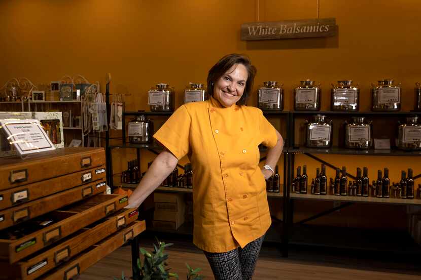 Owner and chef Michelle Spangler poses for a portrait at her store, Infused Oils and...