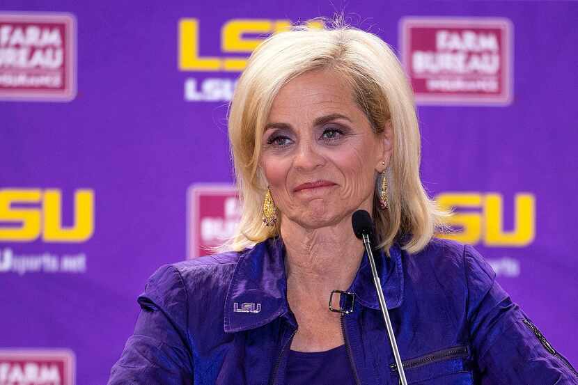 New LSU women's basketball coach Kim Mulkey smiles during an introductory NCAA college...