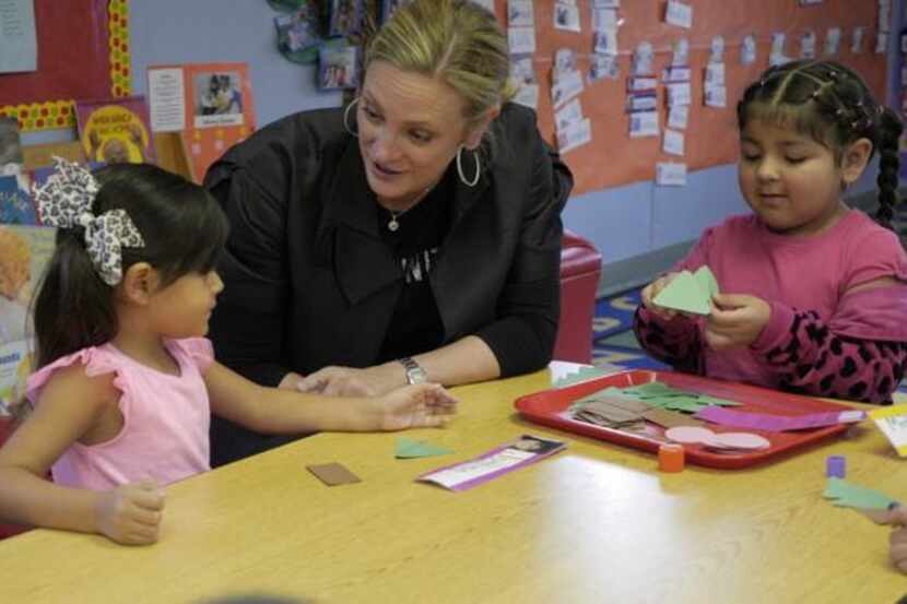 
Jennifer Sampson, President and CEO of United Way of Metropolitan Dallas visits with...