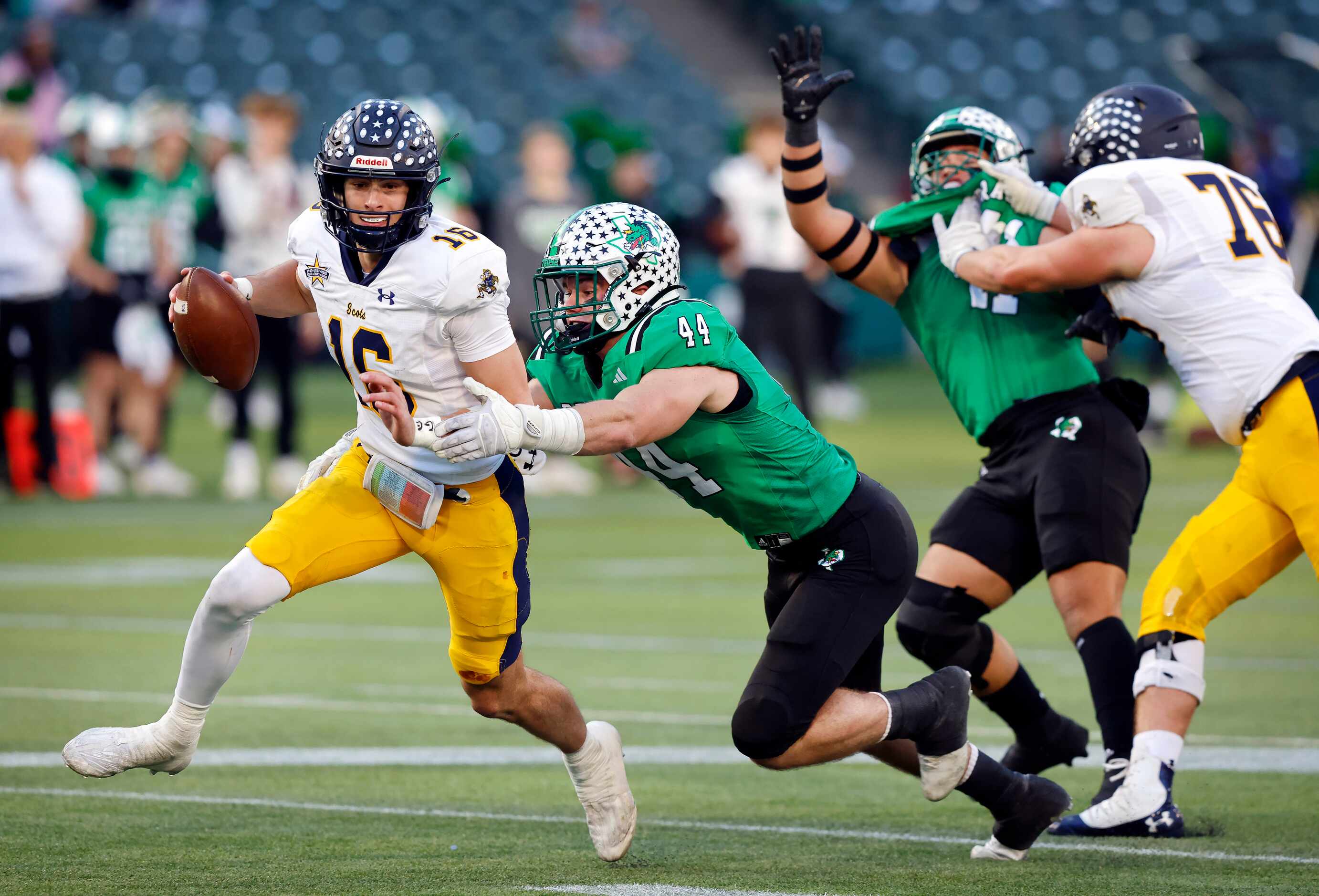 Southlake Carroll defensive lineman Dustan Mark (44) attempts to tackle Highland Park...