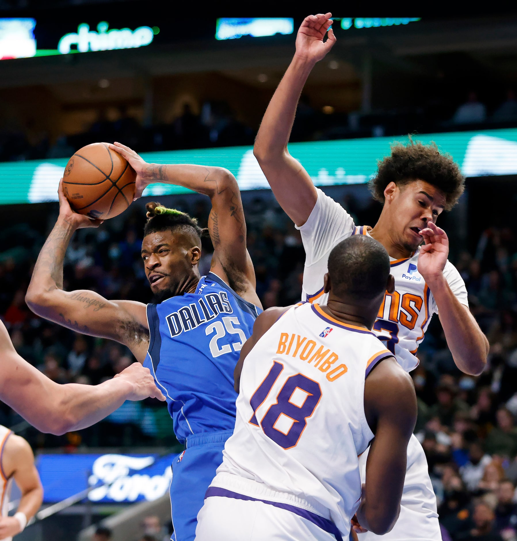 Dallas Mavericks forward Reggie Bullock (25) comes down with a defensive rebound against...