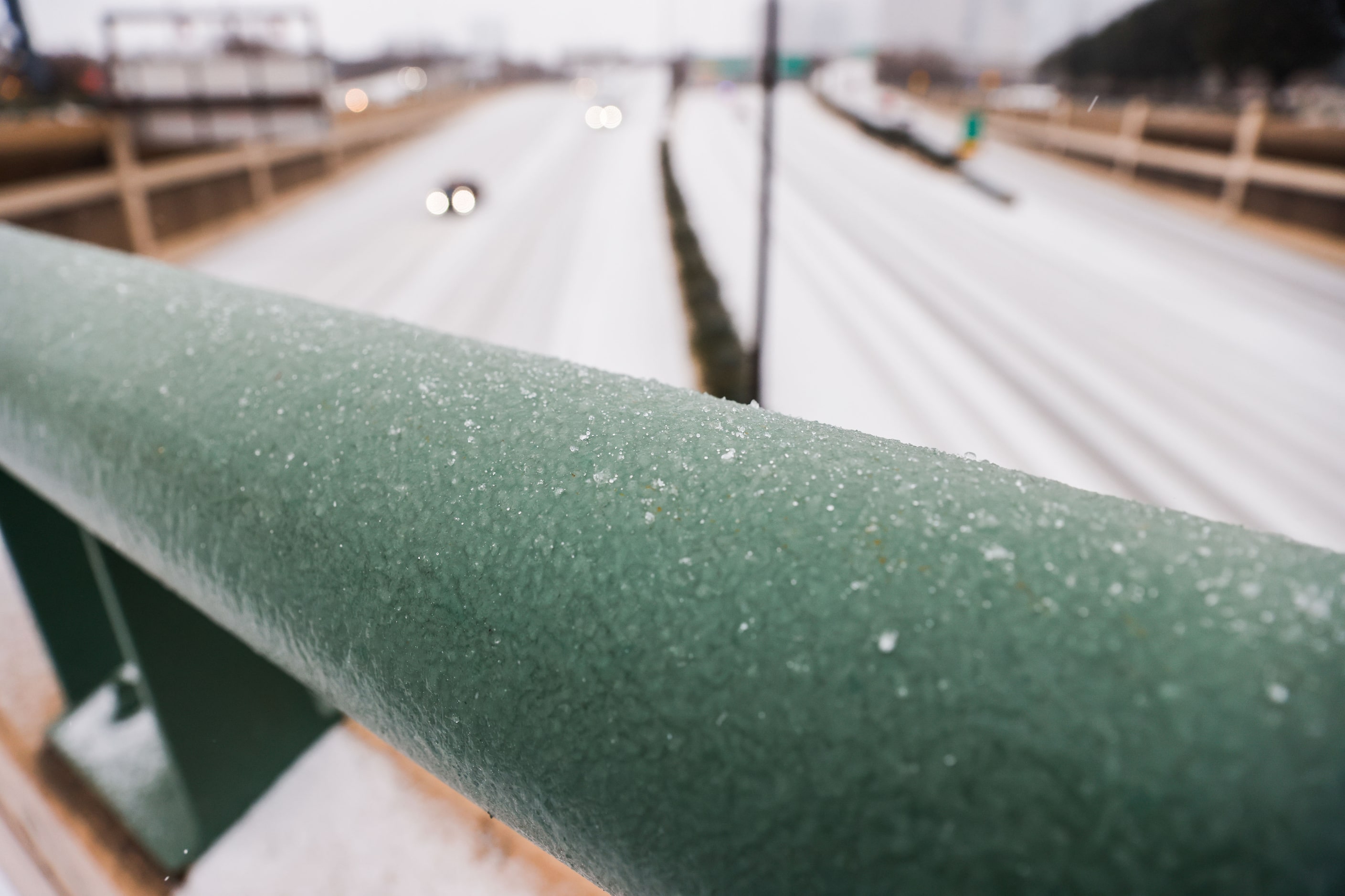 Traffic on US-75 near downtown as sleet falls over the Dallas metroplex on Tuesday, Jan. 31,...