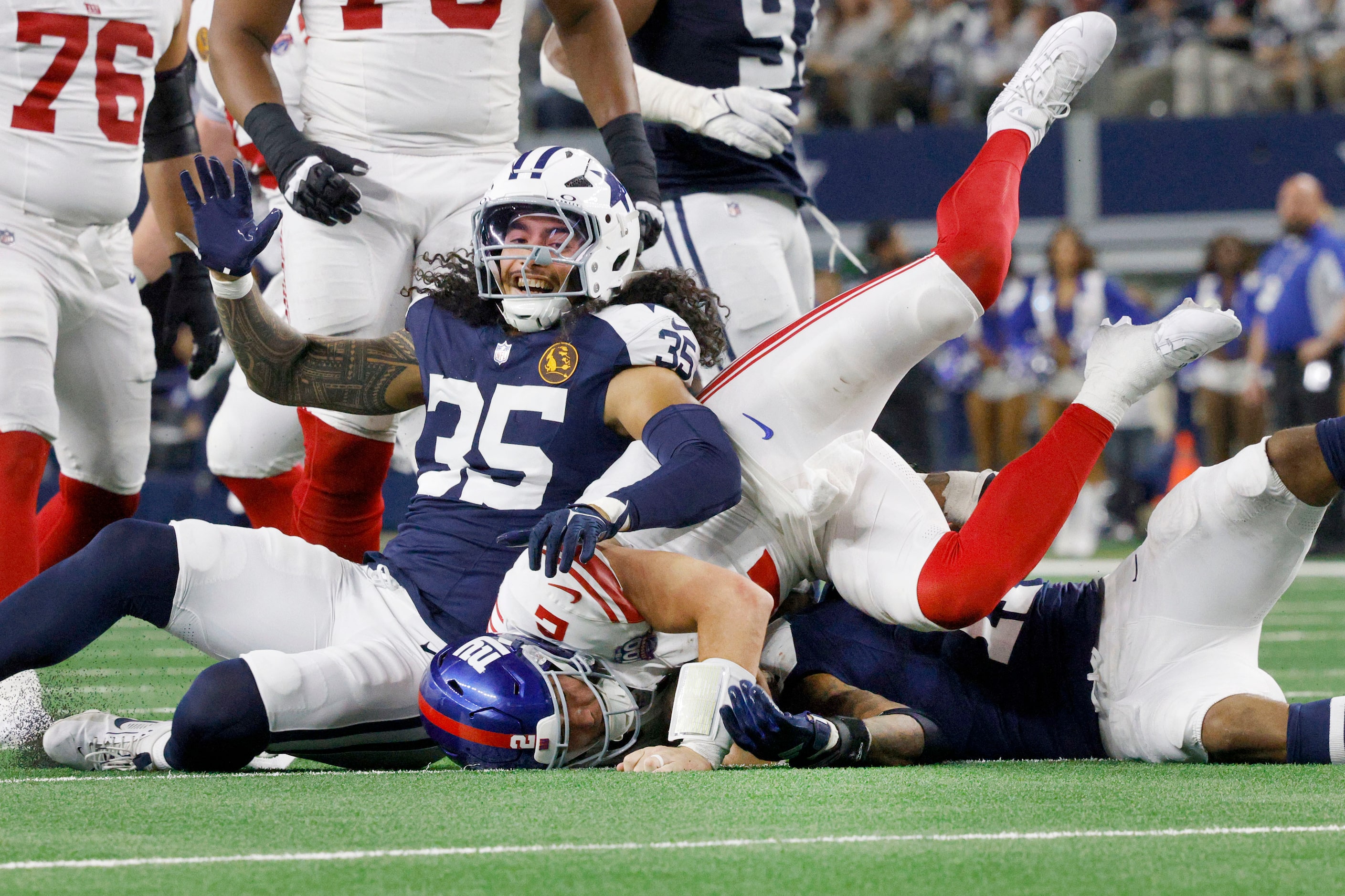 New York Giants quarterback Drew Lock (2) is sacked by Dallas Cowboys linebacker Marist...