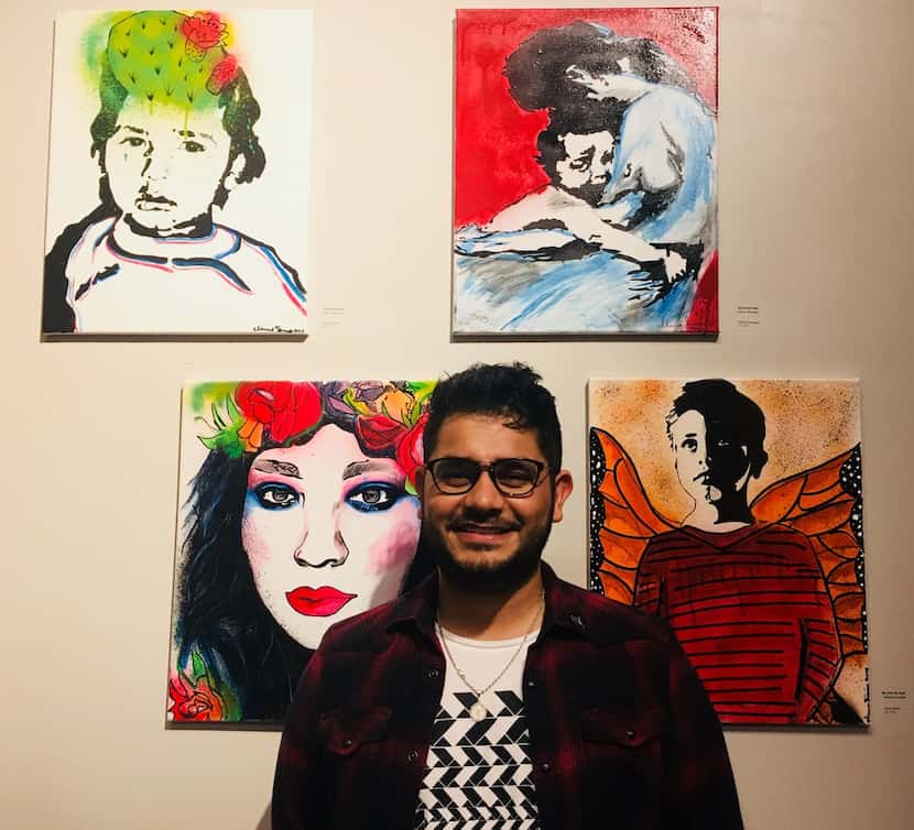 The artist Marco Saucedo photographed with his paintings during the art show MaricónX...