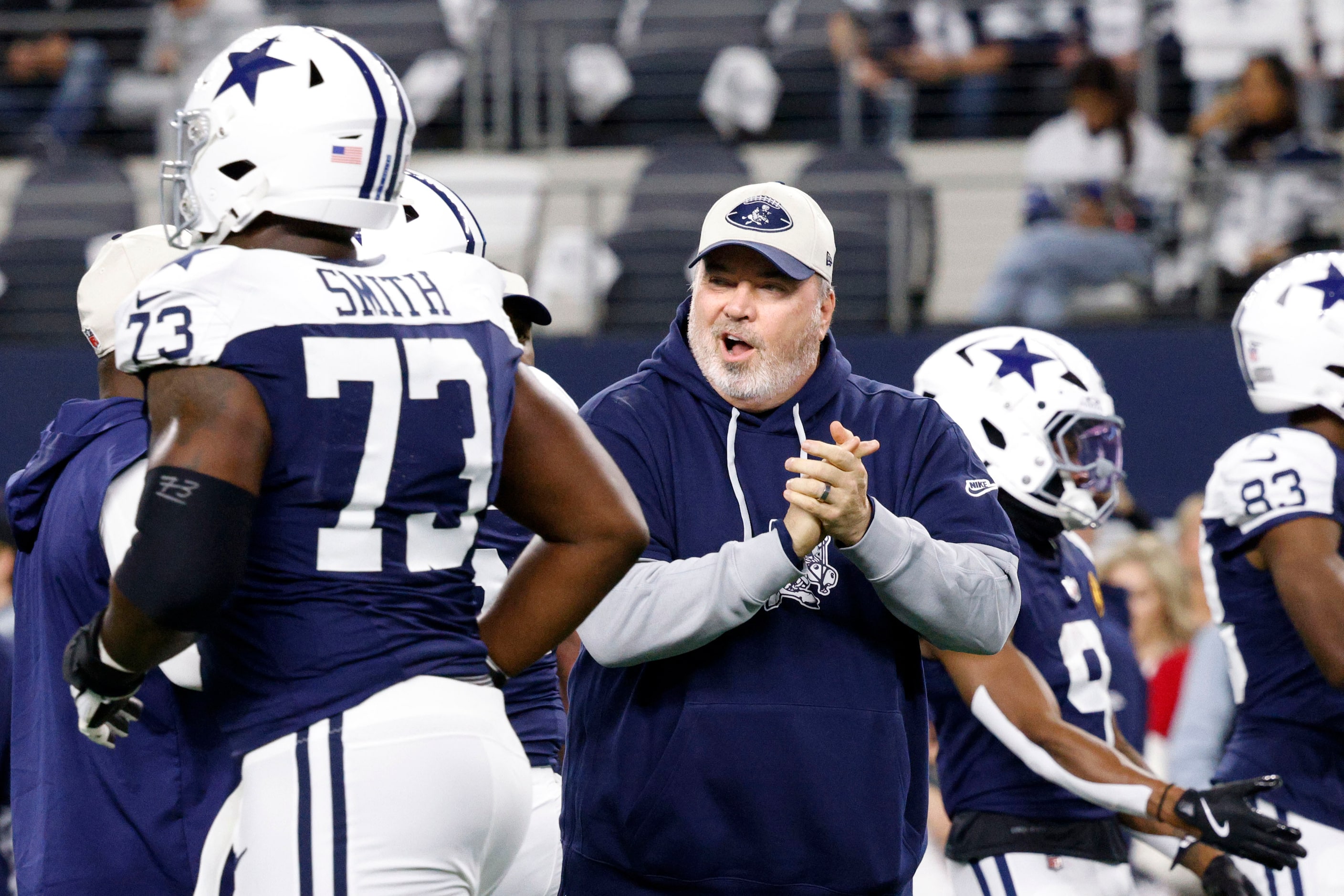 Dallas Cowboys head coach Mike McCarthy cheers before an NFL football game against the New...