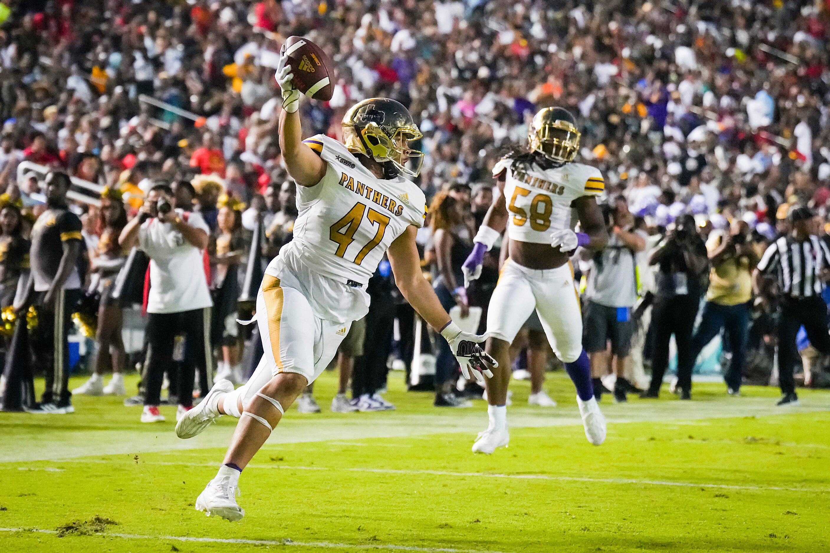 Prairie View defensive end Xxavier Watson (47) celebrates as he returns a Grambling  fumble...