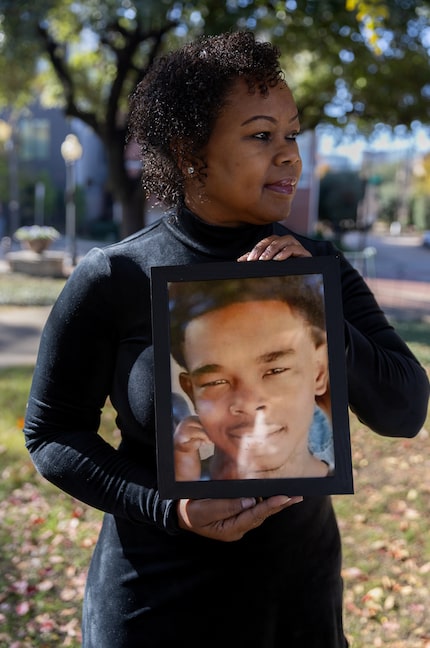 Rosalind Jackson poses with a portrait of her youngest son, Sa’Von Bell, at Griggs Park in...