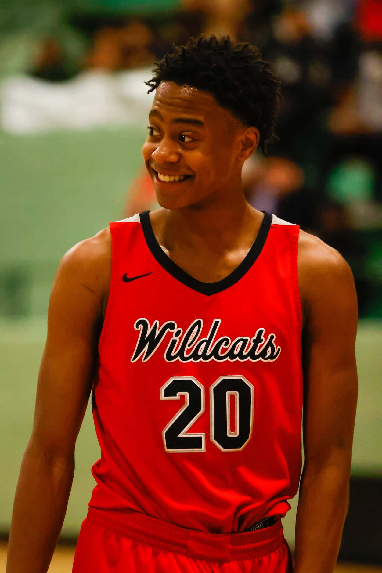 Lake Highlands High School' Tre Johnson #20, smiles during a game against Berkner High...