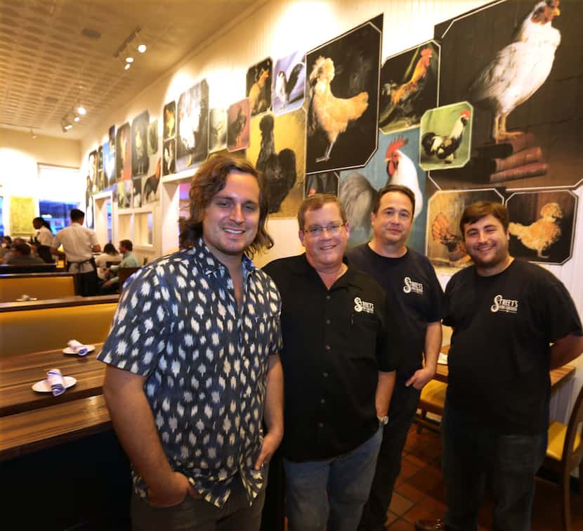 Owners Marco, Dace, Tony and Penrod Street, left to right,  in Street's Fine Chicken's...