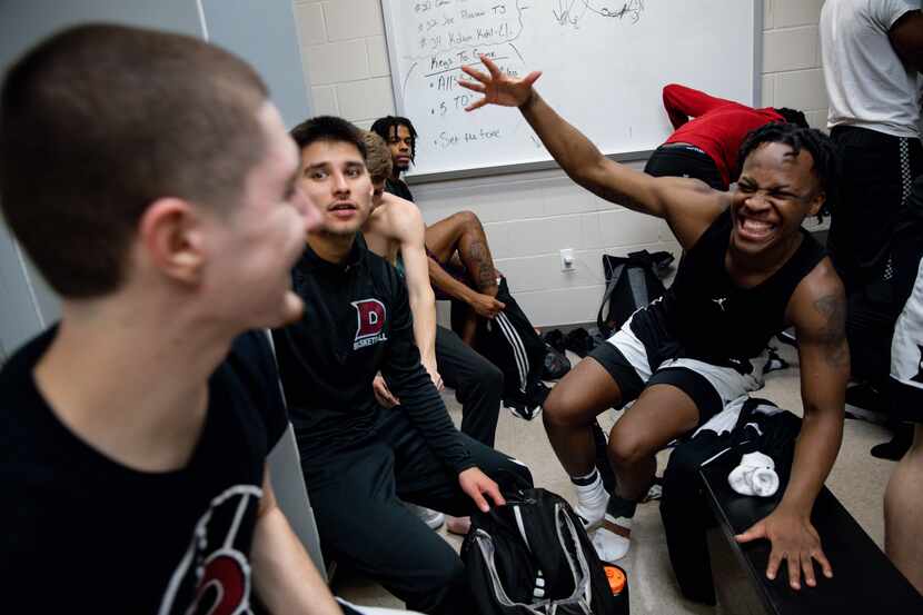 Dallas Christian College basketball player Jordan Chambers-Harris (right) gets ready to...