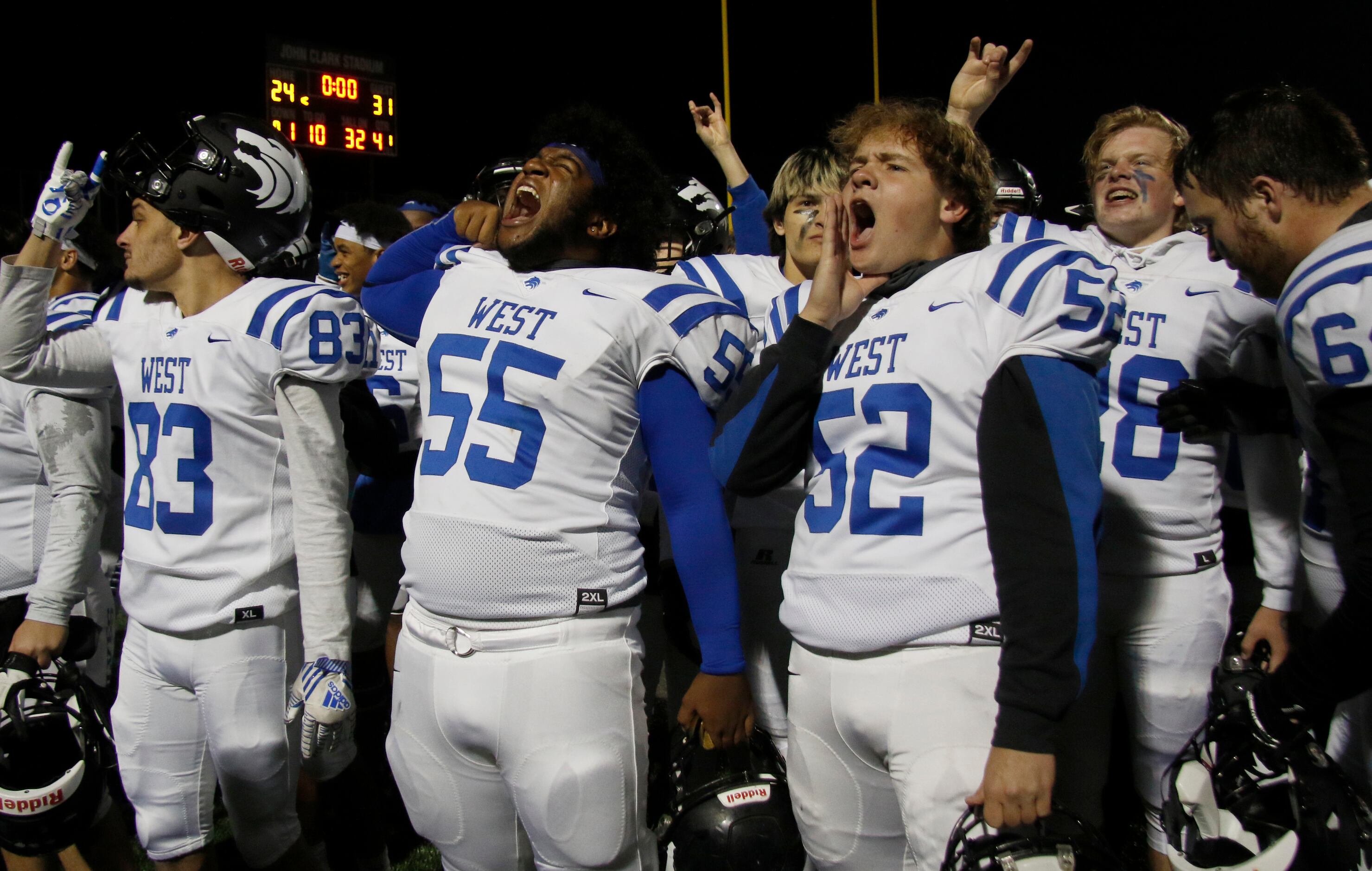Plano West offensive linemen Jaylen Edwards (55) and Cortland Barnett (52) let out a yell as...