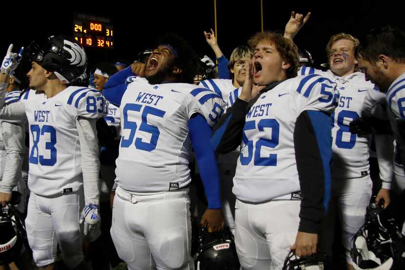 Plano West offensive linemen Jaylen Edwards (55) and Cortland Barnett (52) let out a yell as...