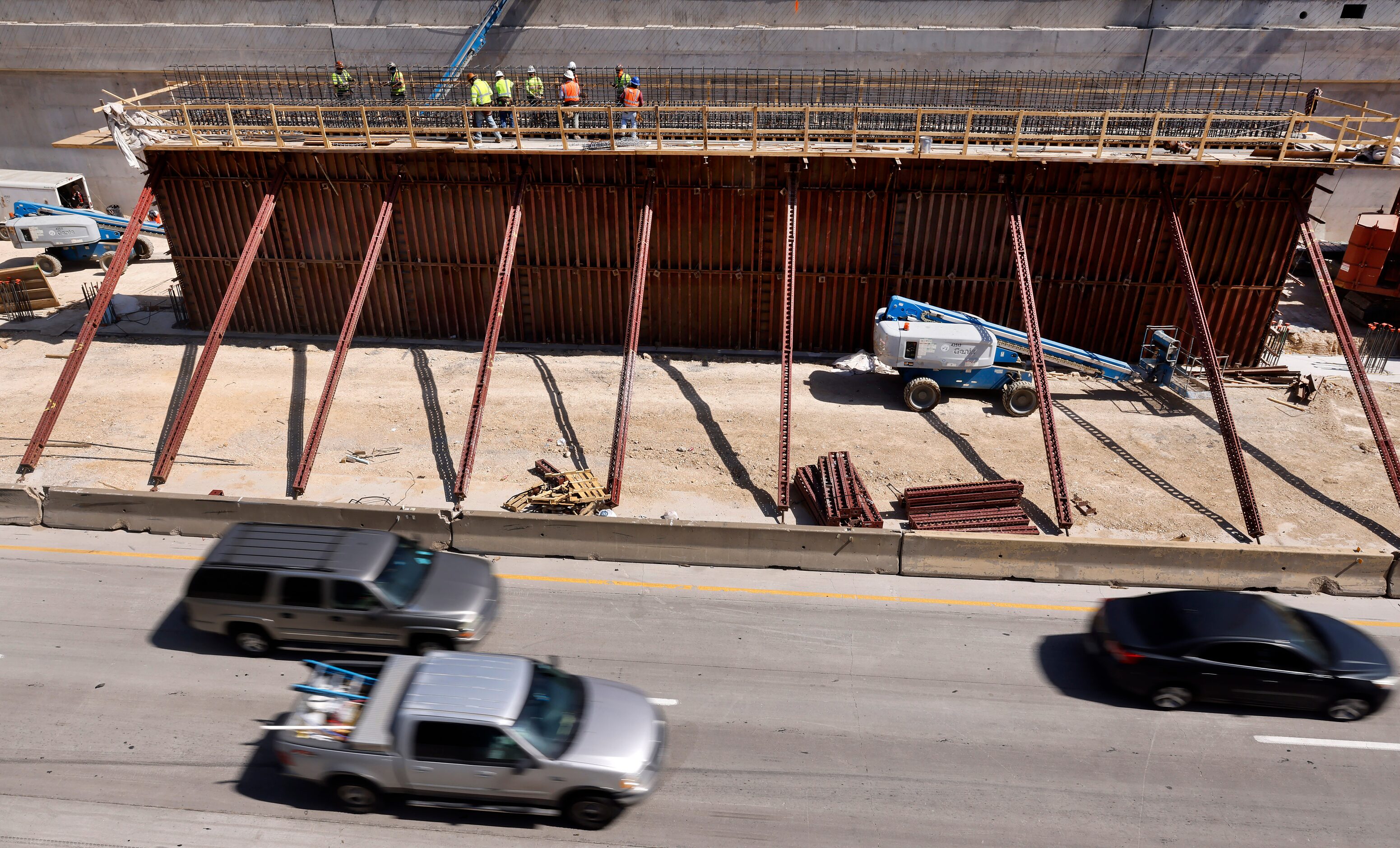 Crews construct support structures for the $172 million Southern Gateway Park on Interstate...