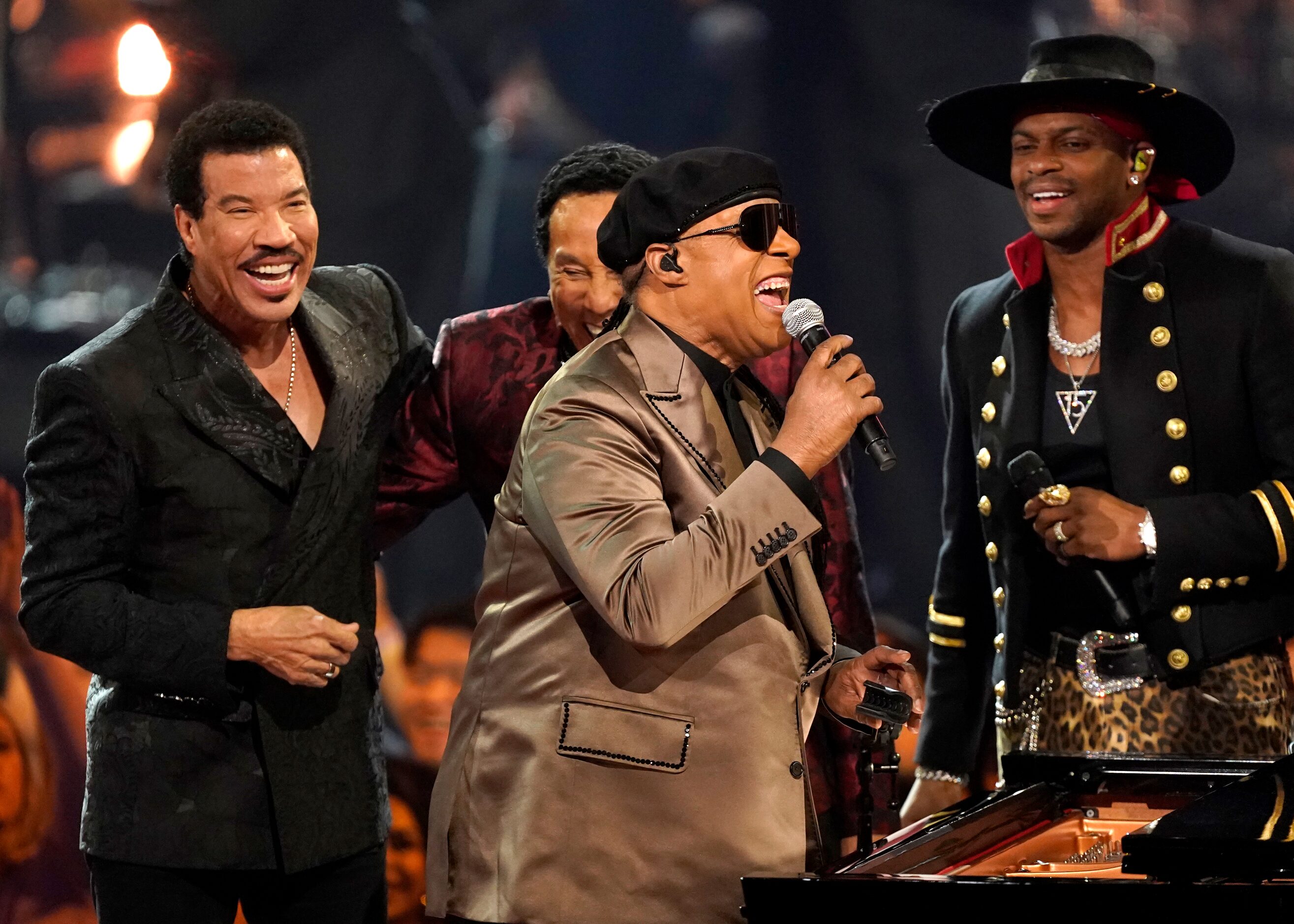 Stevie Wonder, center, and from left, Icon award recipient Lionel Richie, Smokey Robinson...