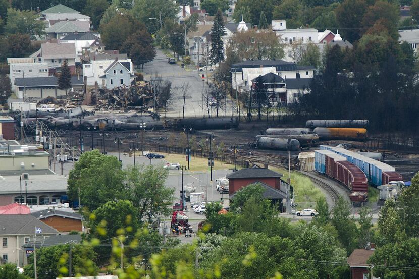 Scorched oil tankers remain on July 10, 2013 at the train derailment site in Lac-Megantic,...
