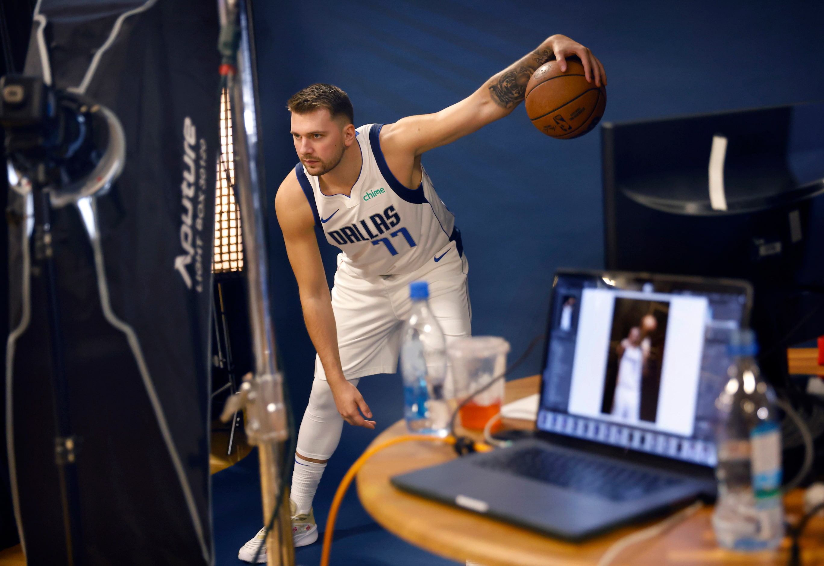 Dallas Mavericks guard Luka Doncic posed for teams of photographers during media day at the...