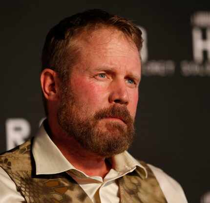  Mark Geist, who is portrayed in the movie, poses for a photograph on the red carpet at the...