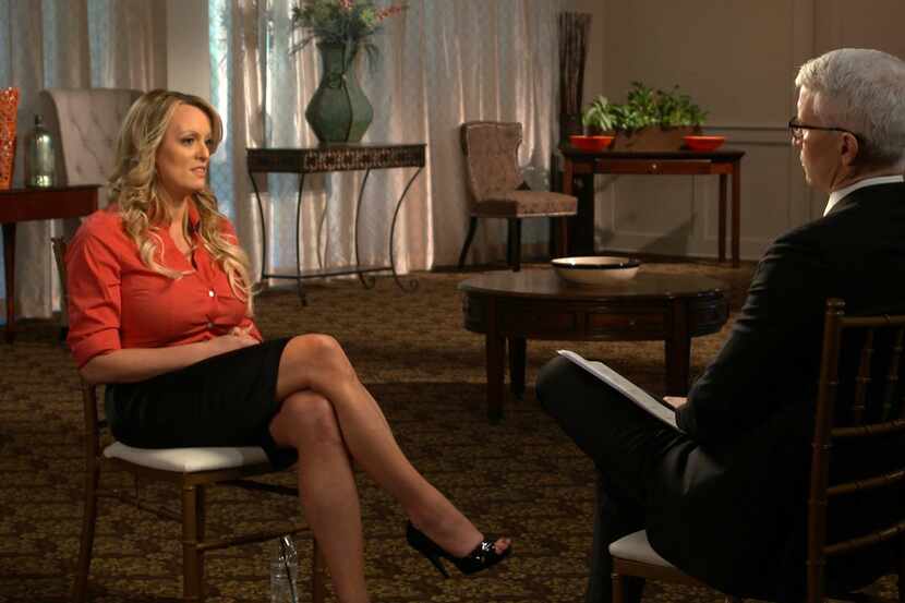 This image released by CBS News shows Stormy Daniels, left, during an interview with...