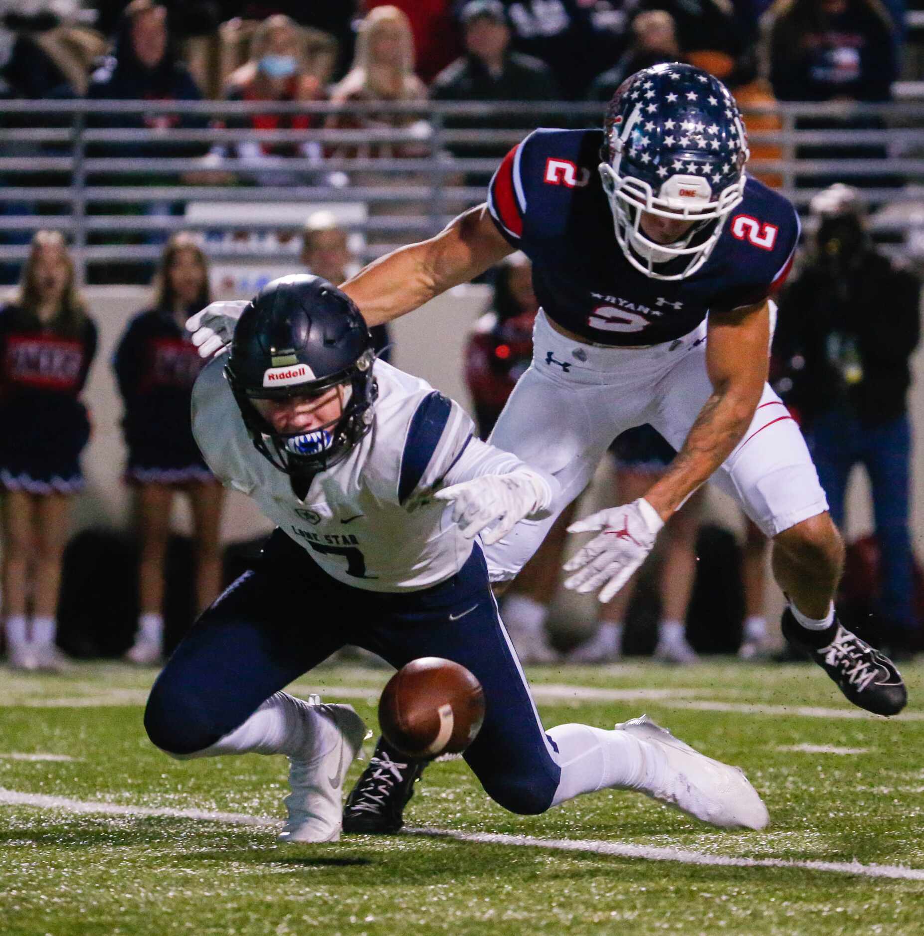A pass intended for Denton Ryan's Billy Bowman Jr. (2) is blocked by the by a Lone Star...