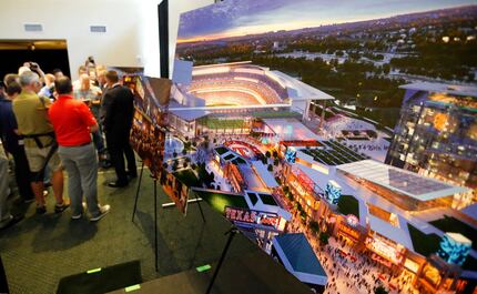 An artist's rendering of the Texas Live! entertainment complex (right) is pictured near...