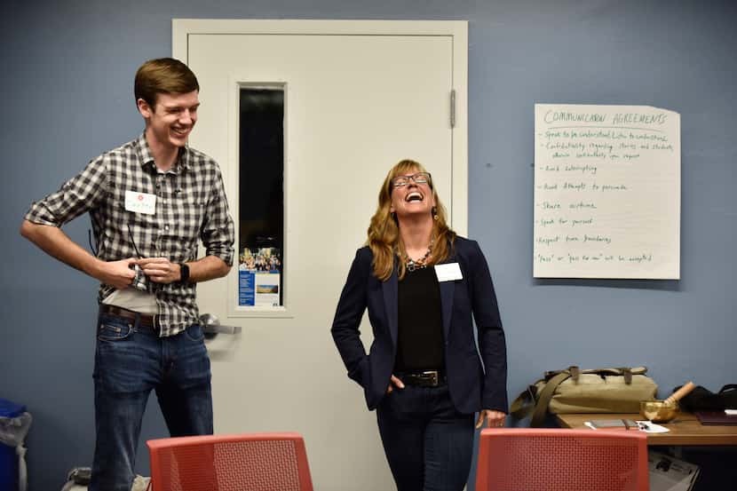 Professor Jill DeTemple shares a laugh with SMU senior Carter Koehler, who served as a...