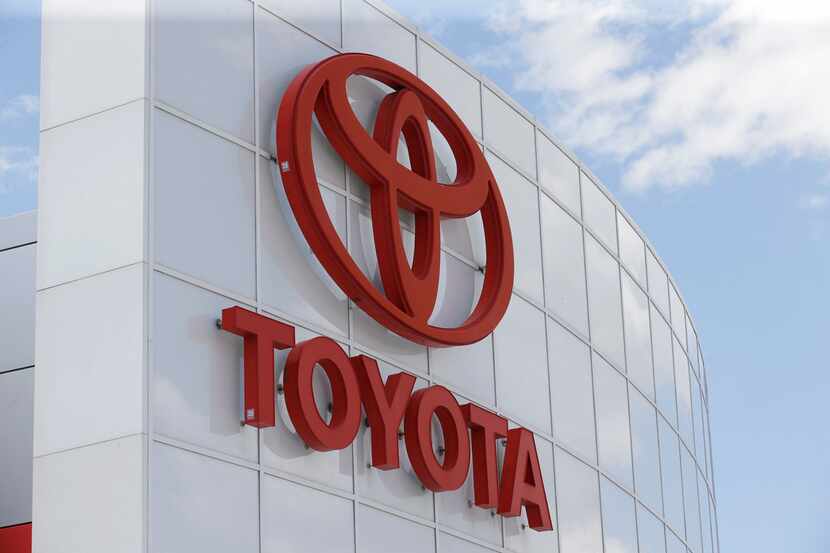 This Tuesday, June 13, 2017, photo, shows the Toyota logo at Mark Miller Toyota in Salt Lake...