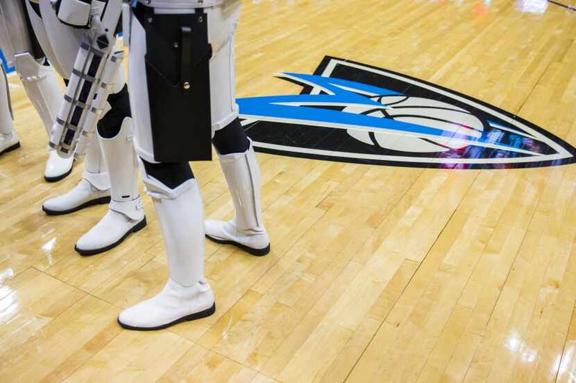 Storm Troopers stand on the Dallas Mavericks court before the Mavs played the Phoenix Suns...