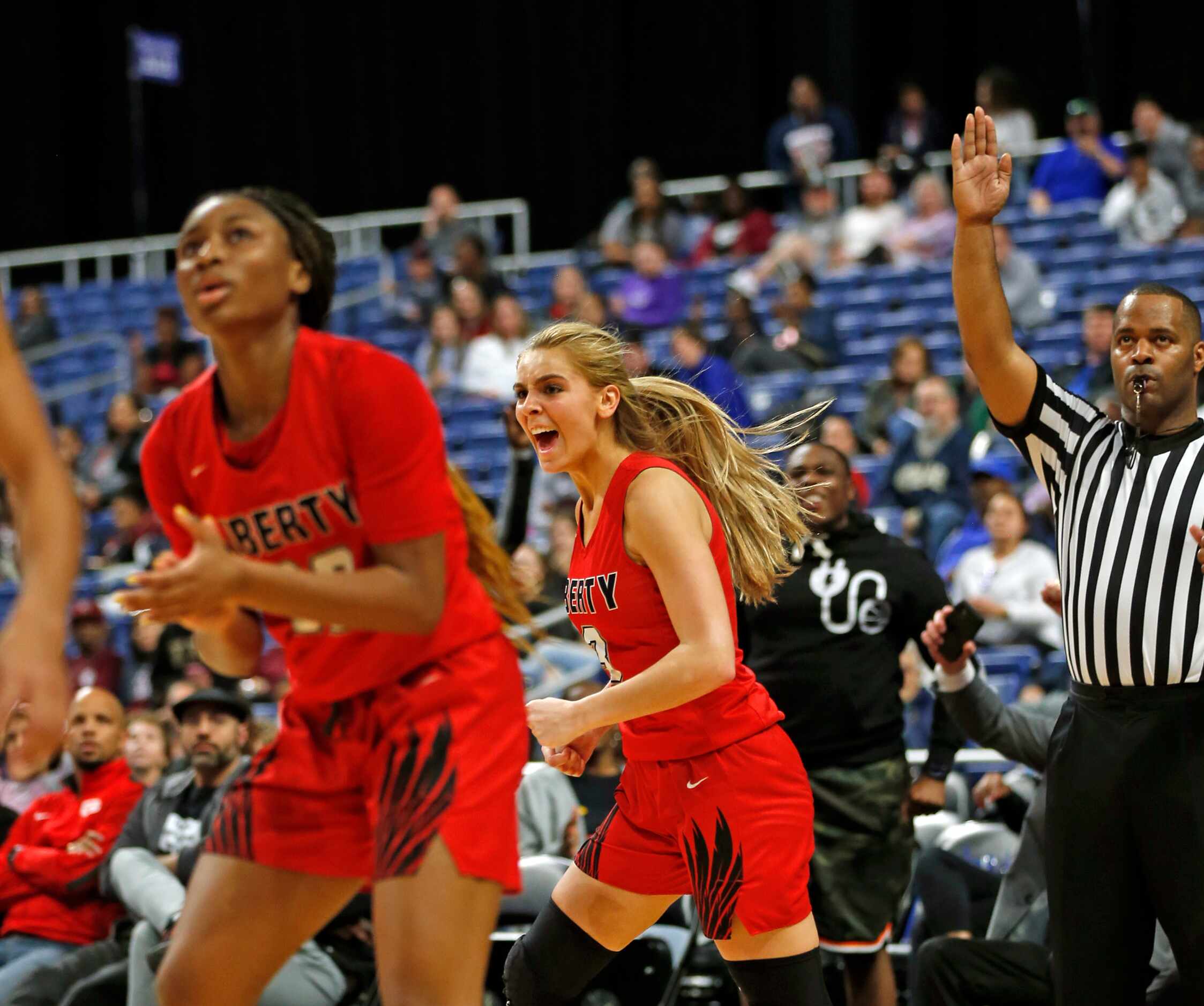 Frisco Liberty guard Lily Ziemkiewicz #3 reacts after hitting game winning three in a 5A...