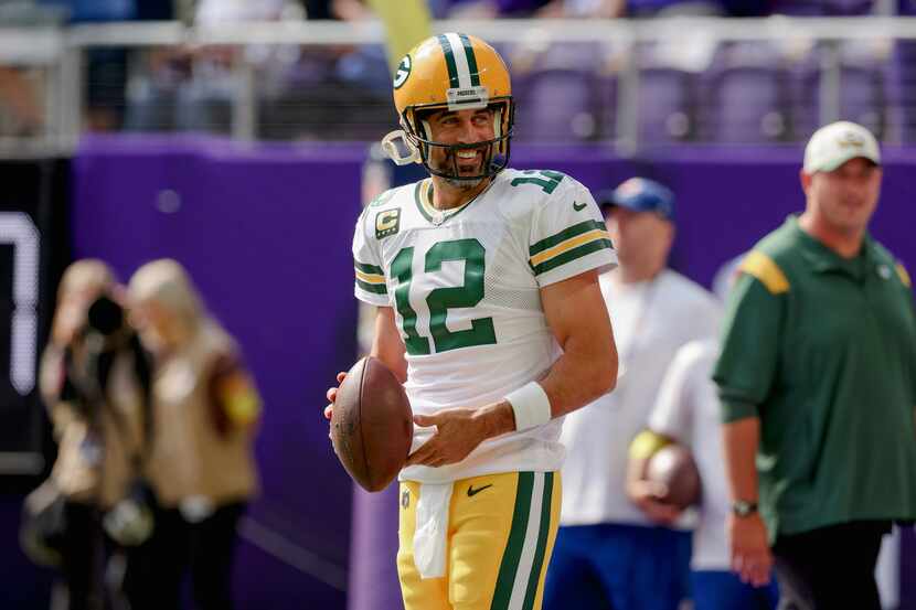 Green Bay Packers quarterback Aaron Rodgers (12) smiles during warm ups before an NFL...