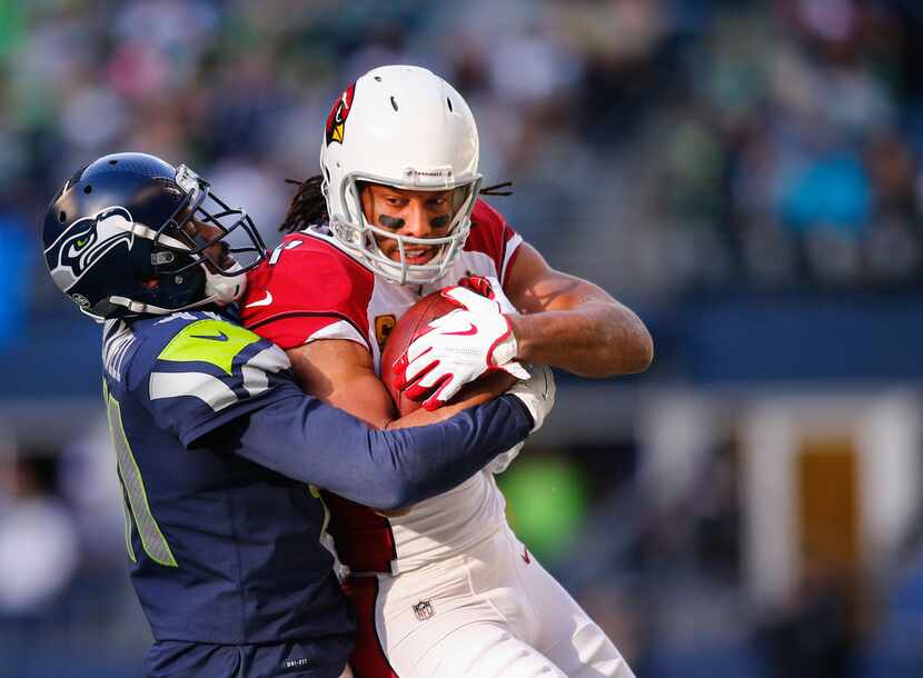 SEATTLE, WA - DECEMBER 31:  Wide receiver Larry Fitzgerald #11 of the Arizona Cardinals is...