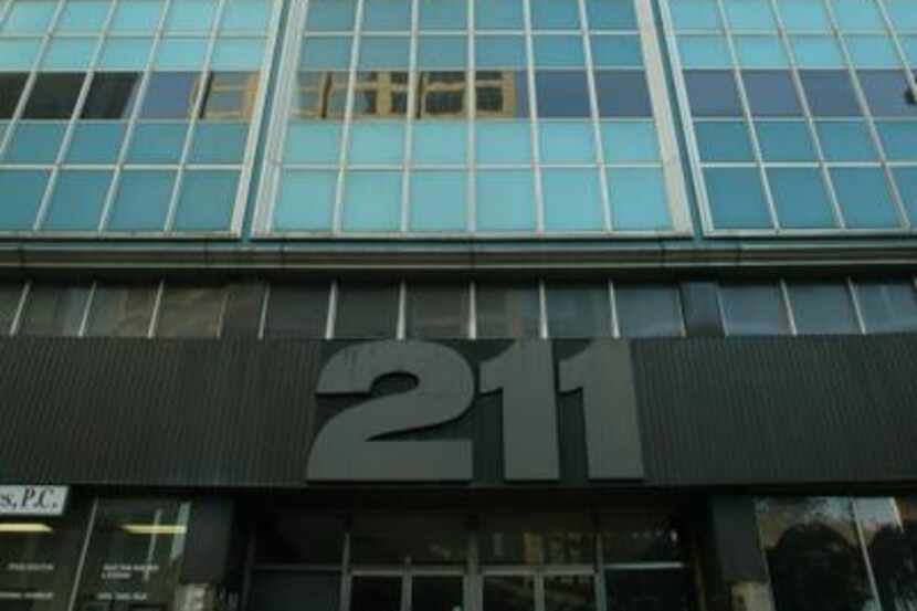 The 211 N. Ervay building, a midcentury office high-rise, is scheduled for foreclosure in...