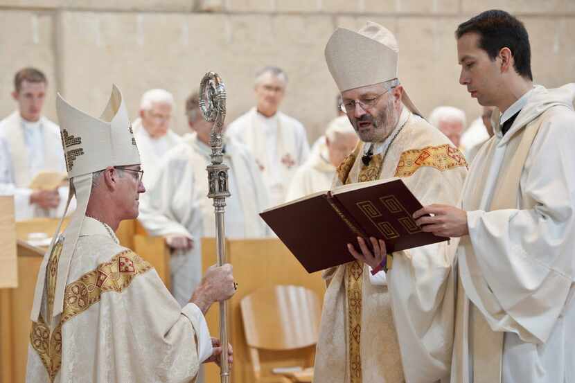 Father Peter Verhalen (left) is installed as abbot of the Cistercian Abbey Our Lady of...