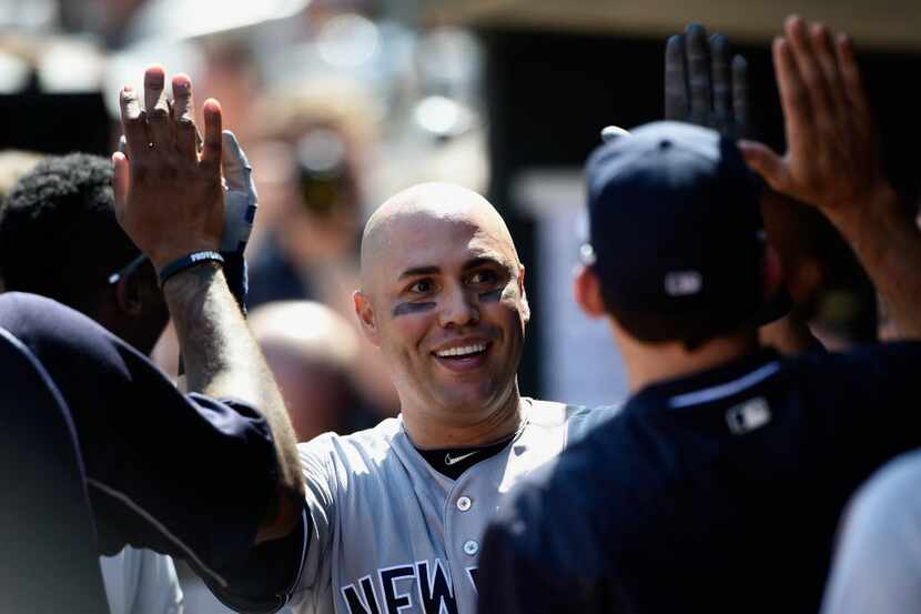 MINNEAPOLIS, MN - JUNE 18: Carlos Beltran #36 of the New York Yankees celebrates hitting a...