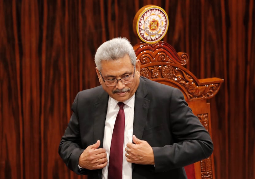 FILE - Sri Lankan President Gotabaya Rajapaksa leaves after addressing parliament during the...